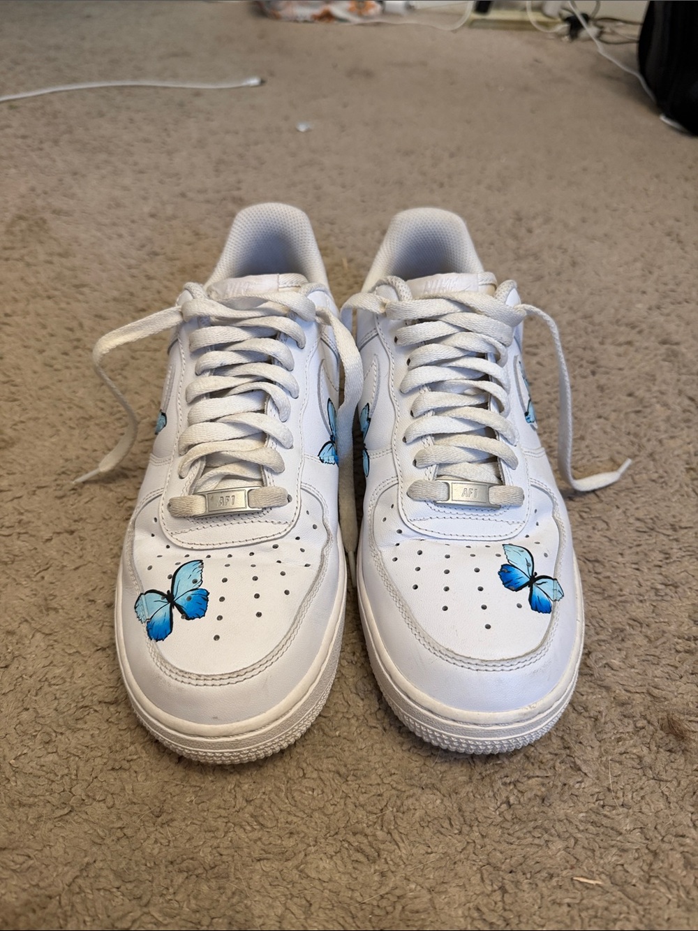 Nike White Kids Sneakers with Blue Butterfly Accents